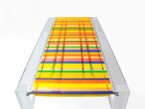 Acrylic dining table in 'Baiadera' by Poliedrica